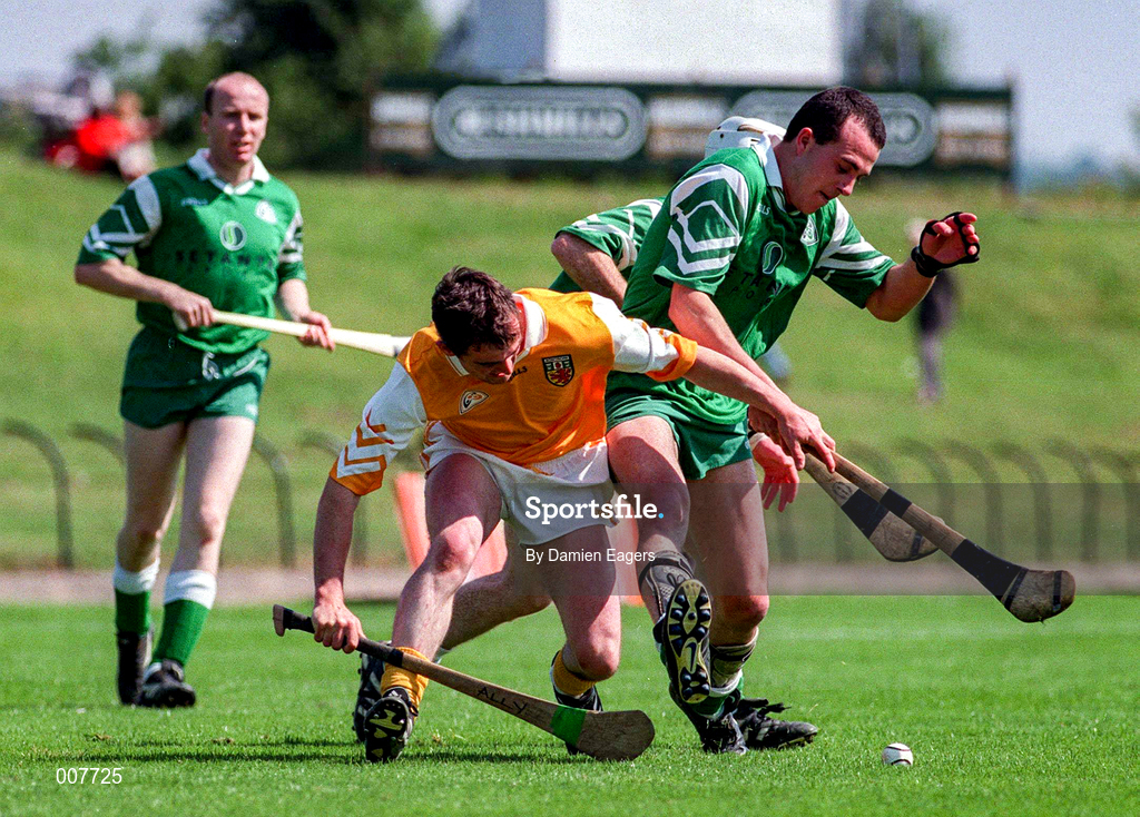 14 June 1998; Brendan Ryan of London in action against Allistair Elliot of Antrim during the Guinness Ulster Senior Hurling Championship Semi-Final match between Antrim and London at Casement Park in Belfast, Antrim, Antrim. Photo by Damien Eagers/Sportsfile