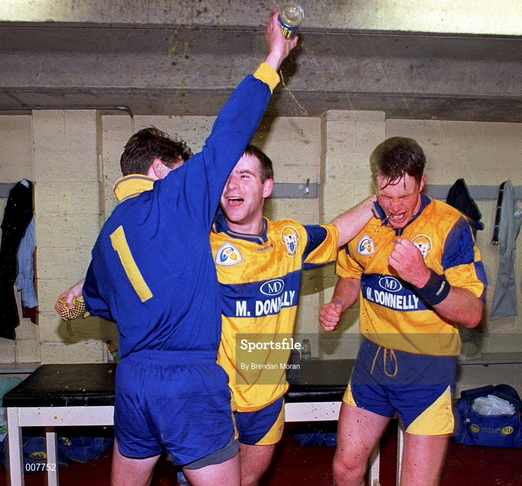 22 June 1997; Clare's Barry Keating, centre, celebrates with team-mates James Hanrahan, left and Michael Hynes, right, following their victory in the Bank of Ireland Munster Senior Football Championship Semi-Final match between Clare and Cork at Cusack Park in Ennis, Clare. Photo by Brendan Moran/Sportsfile