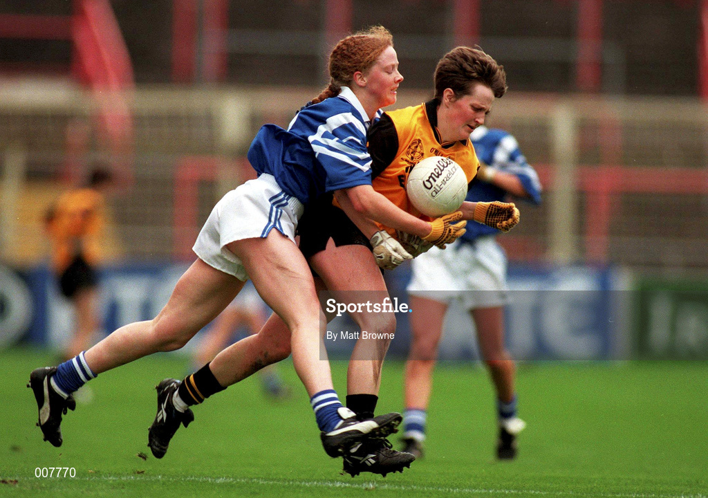 12 October 1997; Brenda McAnespie of Monaghan is tackled by Gearldine O'Ryan of Waterford during the All-Ireland Senior Ladies Football Championship Final between Monaghan and Waterford at Croke Park in Dublin. Photo by Matt Browne/Sportsfile
