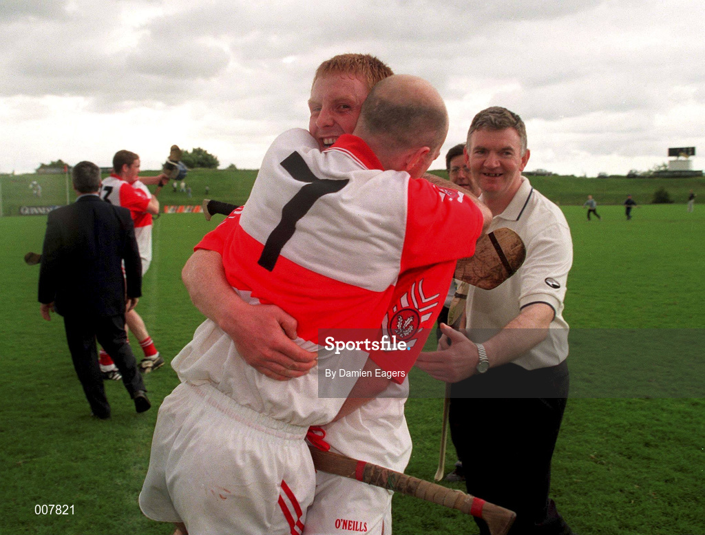 21 June 1998; Calum McGuirk, 7, and his Derry team-mate Garry Briggs celebrate their victory following the Guinness Ulster Senior Hurling Championship Semi-Final match between Derry and Down at Casement Park in Belfast, Antrim. Photo by Damien Eagers/Sportsfile