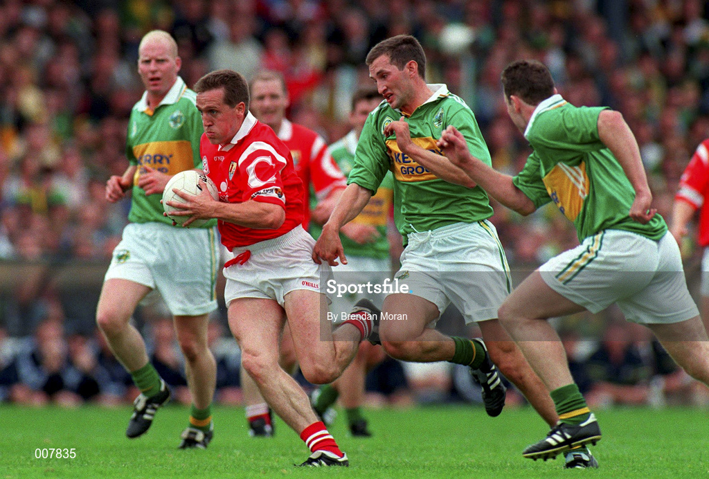 5 July 1998; Ciaran O'Sullivan of Cork in action against Donal Daly and Seamus Moynihan, right, of Kerry during the Bank of Ireland Munster Senior Football Championship Semi-Final match between Kerry and Cork at Fitzgerald Stadium in Killarney, Kerry. Photo by Brendan Moran/Sportsfile