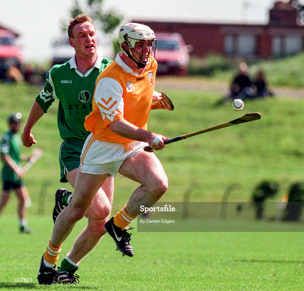 14 June 1998; Colm McGuckian of Antrim in action against Pat Jordon of London during the Guinness Ulster Senior Hurling Championship Semi-Final match between Antrim and London at Casement Park in Belfast, Antrim, Antrim. Photo by Damien Eagers/Sportsfile