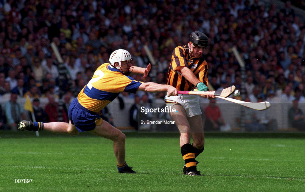 17 August 1997; DJ Carey of Kilkenny has his shot blocked down by Michael O'Halloran of Clare during the Guinness All-Ireland Senior Hurling Championship Semi-Final match between Clare and Kilkenny at Croke Park in Dublin. Photo by Brendan Moran/Sportsfile