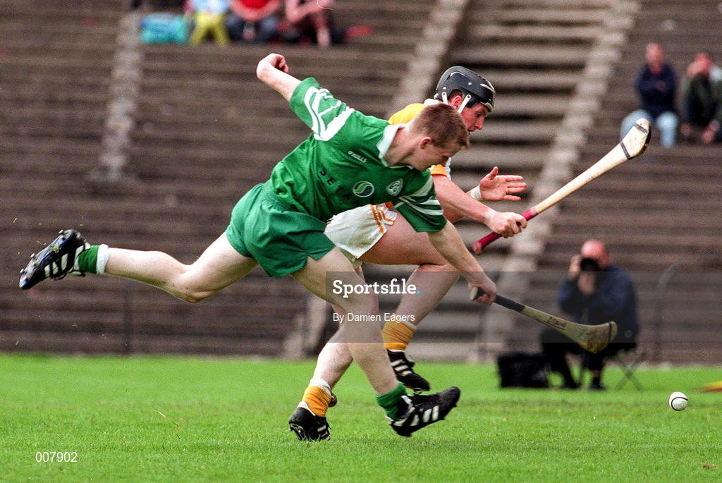 21 June 1998; Damien Browne of London in action against Gregory O'Kane of Antrim during the Guinness Ulster Senior Hurling Championship Semi-Final Replay match between Antrim and London at Casement Park in Belfast, Antrim. Photo by Damien Eagers/Sportsfile