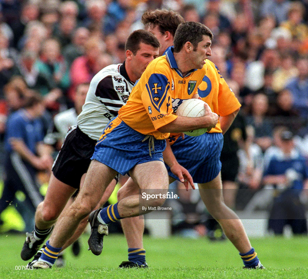 28 June 1998; Damien Donlon of Roscommon is tackled by Paul Taylor of Sligo during the Bank of Ireland Connacht Senior Football Championship Semi-Final match between Roscommon and Sligo at Dr Hyde Park in Roscommon. Photo by Matt Browne/Sportsfile