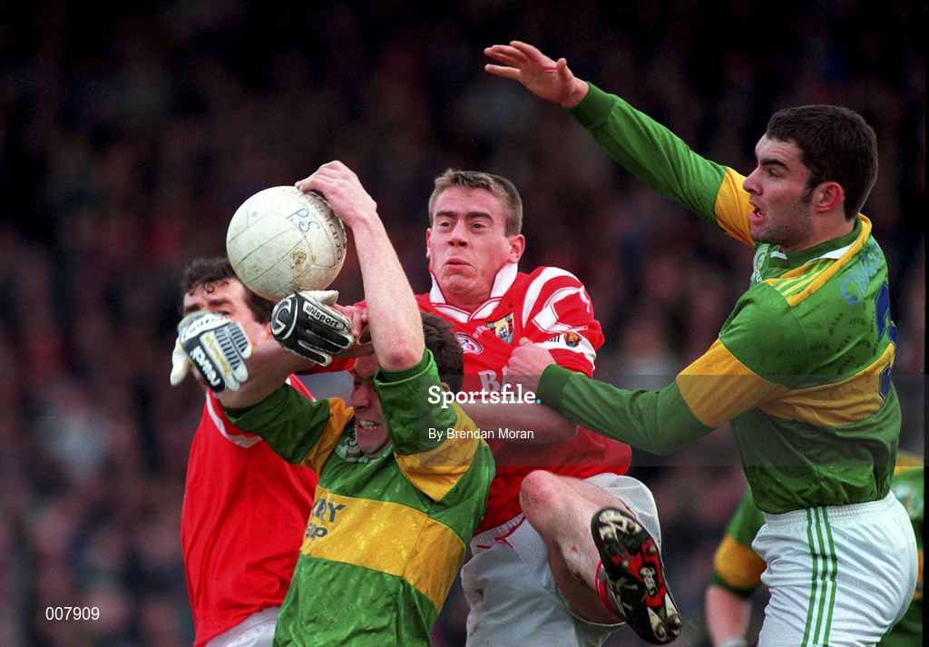 2 March 1997; Terry Dillon and Damien O'Neill of Cork in action against Seamus Moynihan and Barry O'Shea, right, of Kerry during the Church & General National Football League Division 1 match between Kerry and Cork at Austin Stack Park in Tralee, Kerry. Photo by Brendan Moran/Sportsfile