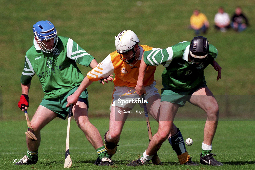 14 June 1998; Eoin Colgan of Antrim in action against Aidan Heany, right, and Eoin Quaine of London during the Guinness Ulster Senior Hurling Championship Semi-Final match between Antrim and London at Casement Park in Belfast, Antrim, Antrim. Photo by Damien Eagers/Sportsfile
