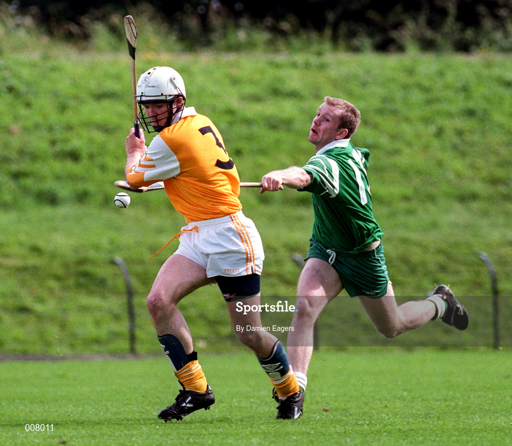 21 June 1998; Eoin Colgan of Antrim in action against Eoin Quaine of London during the Guinness Ulster Senior Hurling Championship Semi-Final Replay match between Antrim and London at Casement Park in Belfast, Antrim. Photo by Damien Eagers/Sportsfile