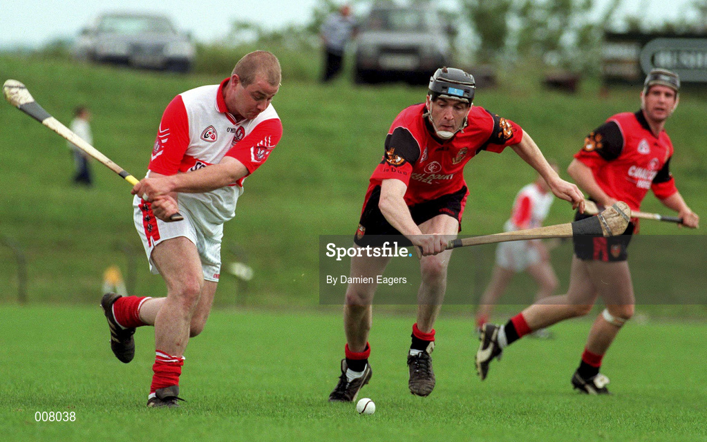 21 June 1998; Geoffrey McGonigle of Derry in action against John McCarthy of Down during the Guinness Ulster Senior Hurling Championship Semi-Final match between Derry and Down at Casement Park in Belfast, Antrim. Photo by Damien Eagers/Sportsfile