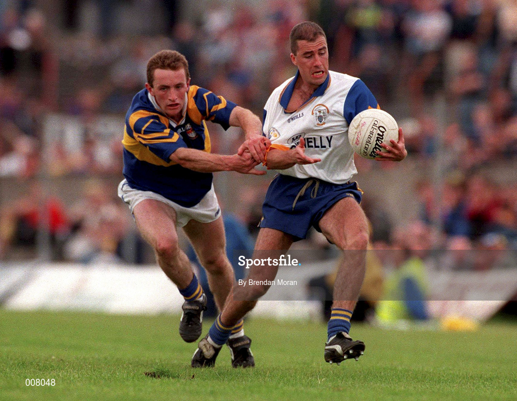 28 June 1998; Ger Keane of Clarek holds off the challenge of Bernard Hahessy of Tipperary during the Bank of Ireland Munster Senior Football Championship Semi-Final match between Tipperary and Clare at the Gaelic Grounds in Limerick. Photo by Brendan Moran/Sportsfile