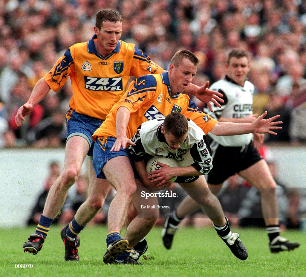 28 June 1998; Gerry McGowan of Sligo is tackled by Michael Ryan and Ronan Owens of Roscommon during the Bank of Ireland Connacht Senior Football Championship Semi-Final match between Roscommon and Sligo at Dr Hyde Park in Roscommon. Photo by Matt Browne/Sportsfile