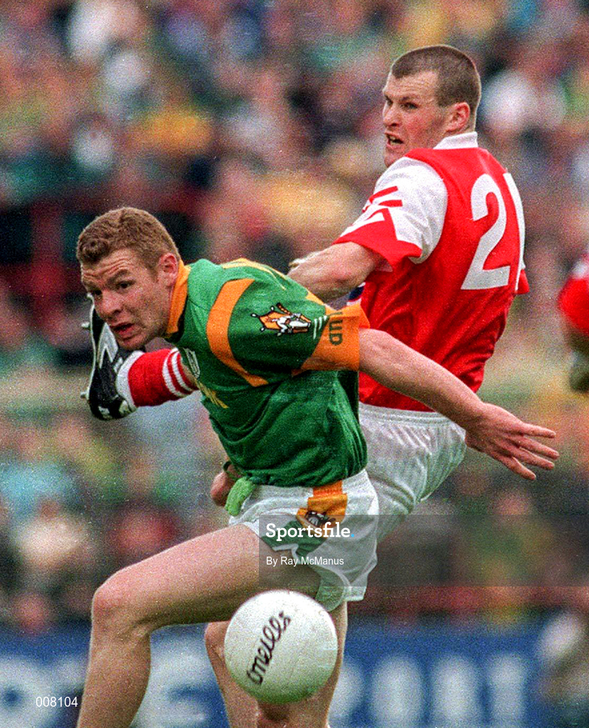 28 June 1998; Tommy Dowd of Meath and Declan O'Sullivan of Louth in a tussle for possession during the Leinster Senior Football Championship Semi-Final match between Meath and Louth at Croke Park in Dublin. Photo by Ray McManus/Sportsfile