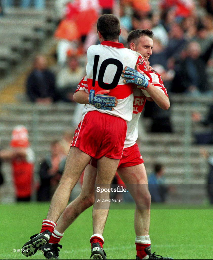 28 June 1998; Derry's Dermot Dougan celebrates with team-mate Eamonn Burns following the Bank of Ireland Ulster Senior Football Championship Semi-Final match between Armagh and Derry at St Tiernach's Park in Clones, Monaghan. Photo by David Maher/Sportsfile