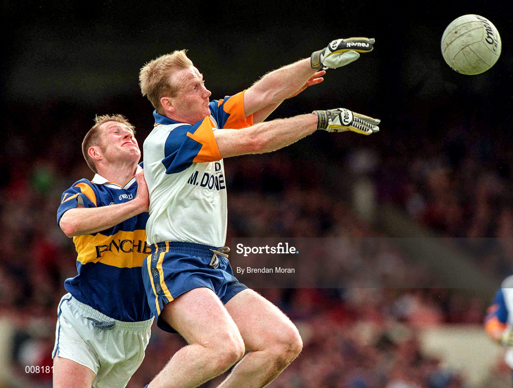 28 June 1998; Frankie Griffin of Clare in action against Michael Spillane of Tipperary during the Bank of Ireland Munster Senior Football Championship Semi-Final match between Tipperary and Clare at the Gaelic Grounds in Limerick. Photo by Brendan Moran/Sportsfile