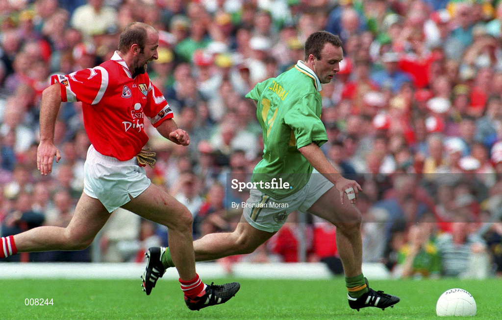 5 July 1998; John Crowley of Kerry in action against Brian Corcoran of Cork during the Bank of Ireland Munster Senior Football Championship Semi-Final match between Kerry and Cork at Fitzgerald Stadium in Killarney, Kerry. Photo by Brendan Moran/Sportsfile