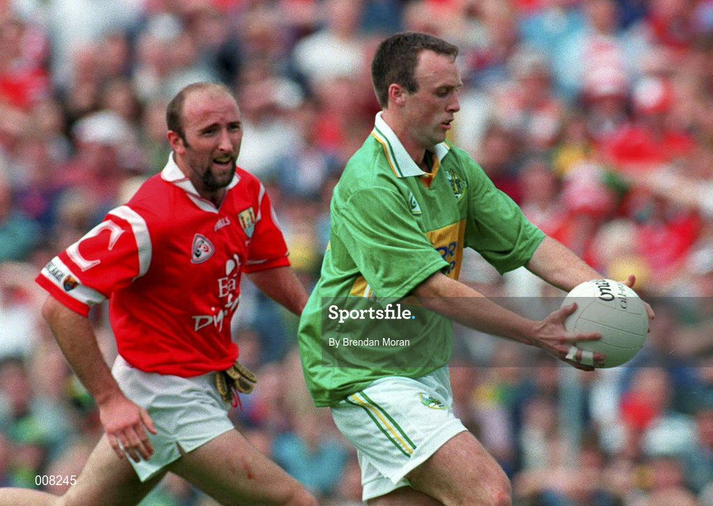 5 July 1998; John Crowley of Kerry in action against Brian Corcoran of Cork during the Bank of Ireland Munster Senior Football Championship Semi-Final match between Kerry and Cork at Fitzgerald Stadium in Killarney, Kerry. Photo by Brendan Moran/Sportsfile