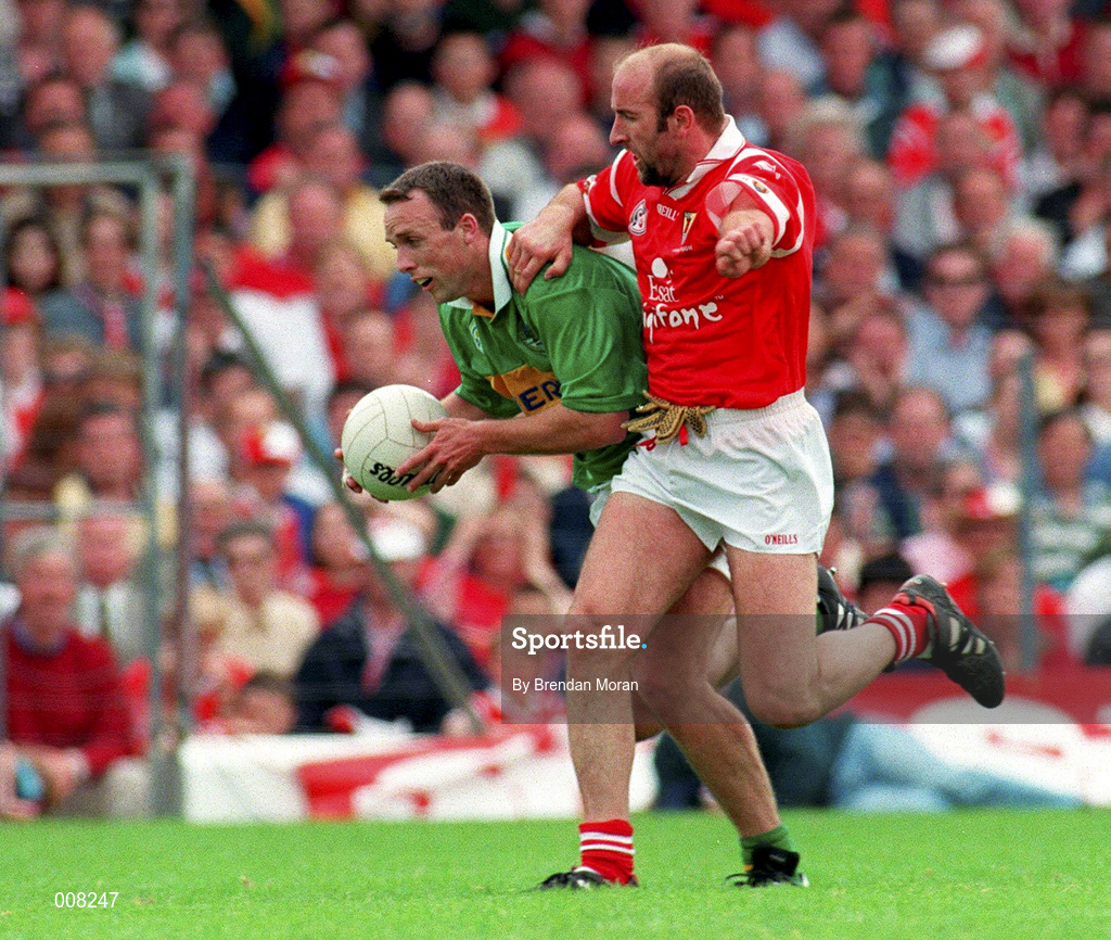 5 July 1998; John Crowley of Kerry in action against Brian Corcoran of Cork during the Bank of Ireland Munster Senior Football Championship Semi-Final match between Kerry and Cork at Fitzgerald Stadium in Killarney, Kerry. Photo by Brendan Moran/Sportsfile