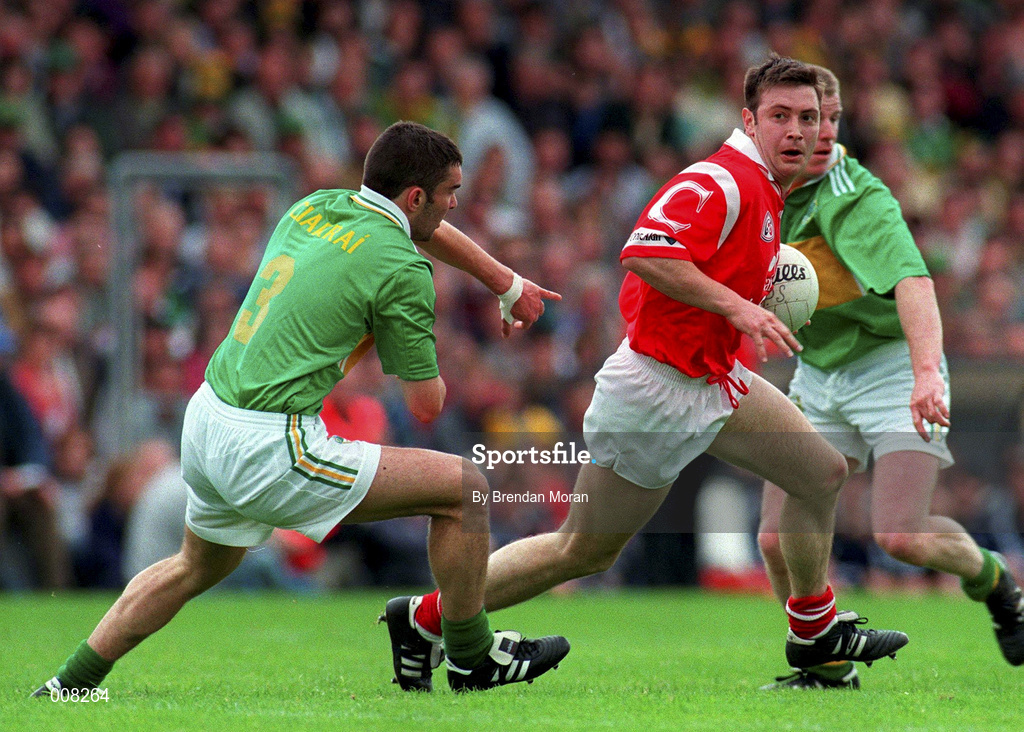 5 July 1998; Joe Kavanagh of Cork in action against Barry O'Shea of Kerry during the Bank of Ireland Munster Senior Football Championship Semi-Final match between Kerry and Cork at Fitzgerald Stadium in Killarney, Kerry. Photo by Brendan Moran/Sportsfile