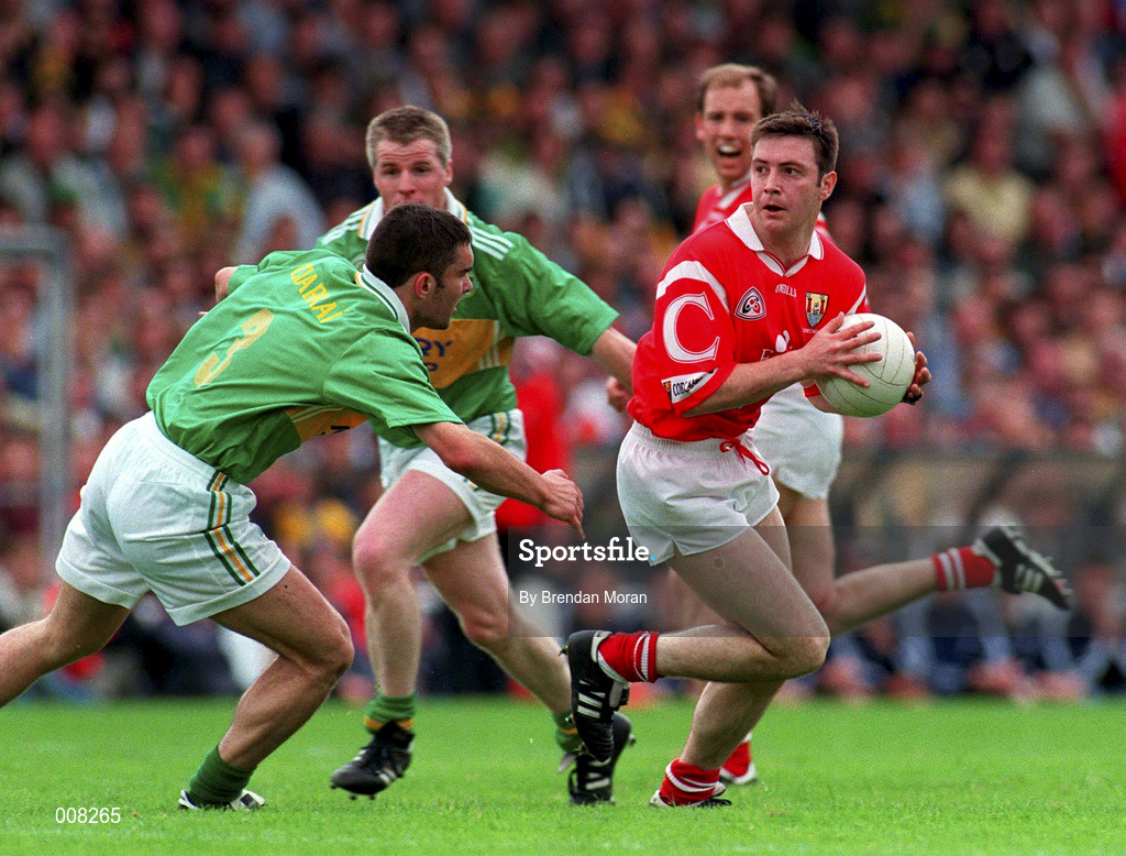 5 July 1998; Joe Kavanagh of Cork in action against Barry O'Shea of Kerry during the Bank of Ireland Munster Senior Football Championship Semi-Final match between Kerry and Cork at Fitzgerald Stadium in Killarney, Kerry. Photo by Brendan Moran/Sportsfile