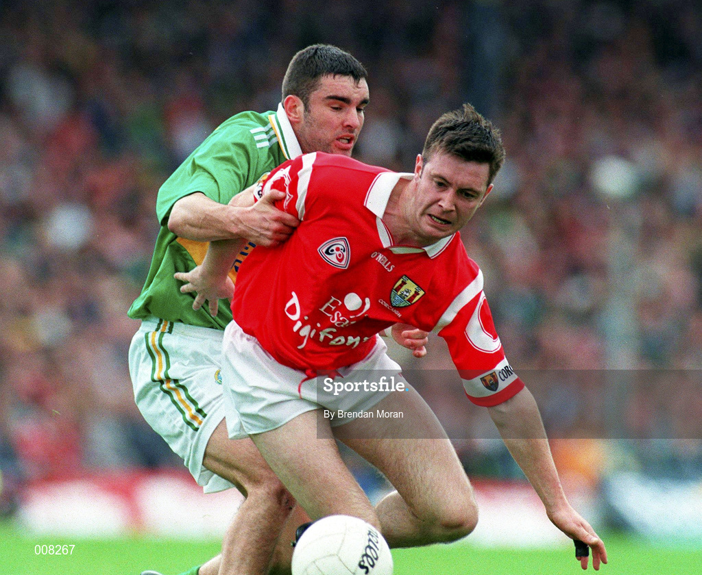 5 July 1998; Joe Kavanagh of Cork in action against Barry O'Shea of Kerry during the Bank of Ireland Munster Senior Football Championship Semi-Final match between Kerry and Cork at Fitzgerald Stadium in Killarney, Kerry. Photo by Brendan Moran/Sportsfile