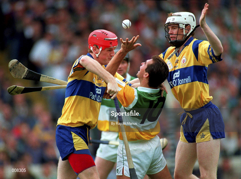 3 September 1995; Johnny Dooley of Offaly is tackled by Brian Lohan , left, and Frank Lohan of Clare during the All-Ireland Senior Hurling Championship Final match between Clare and Offaly at Croke Park in Dublin. Photo by Ray McManus/Sportsfile