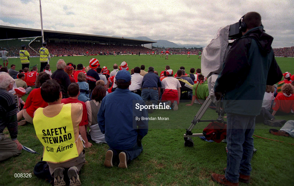 5 July 1998; Cork supporters watch the match from behind the goal during the Bank of Ireland Munster Senior Football Championship Semi-Final match between Kerry and Cork at Fitzgerald Stadium in Killarney, Kerry. Photo by Brendan Moran/Sportsfile