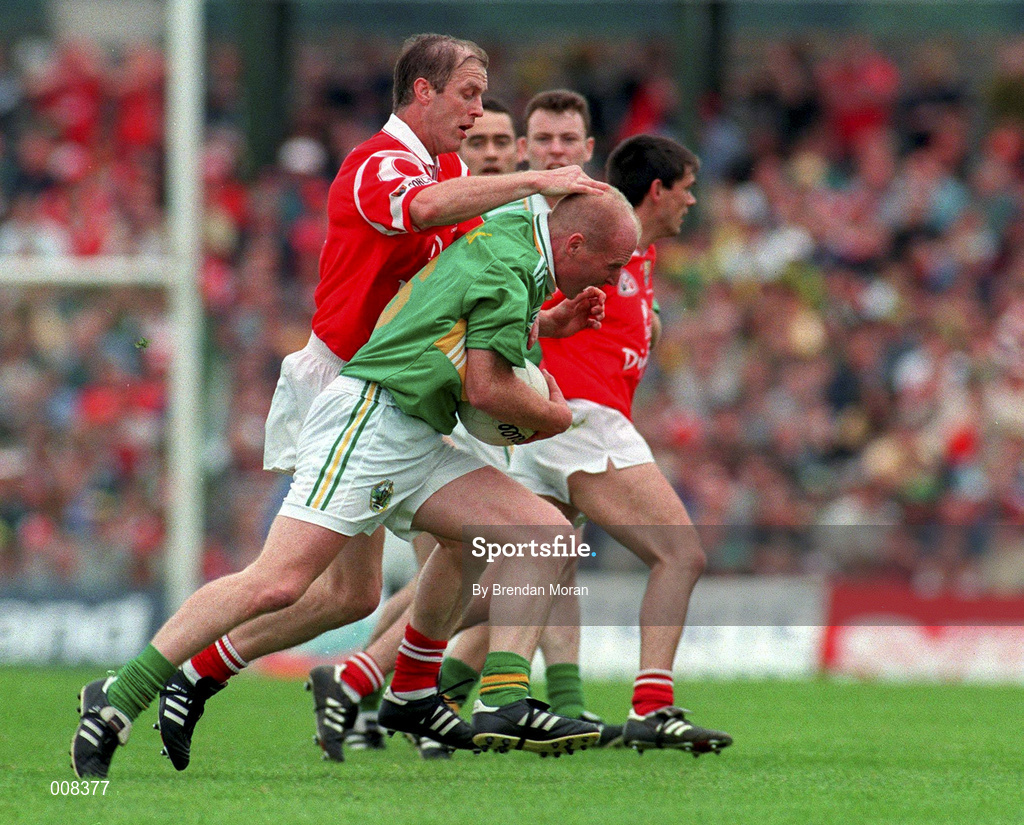 5 July 1998; Kerry's Liam Flaherty holds off the challenge of Cork player-manager Larry Tompkins during the Bank of Ireland Munster Senior Football Championship Semi-Final match between Kerry and Cork at Fitzgerald Stadium in Killarney, Kerry. Photo by Brendan Moran/Sportsfile