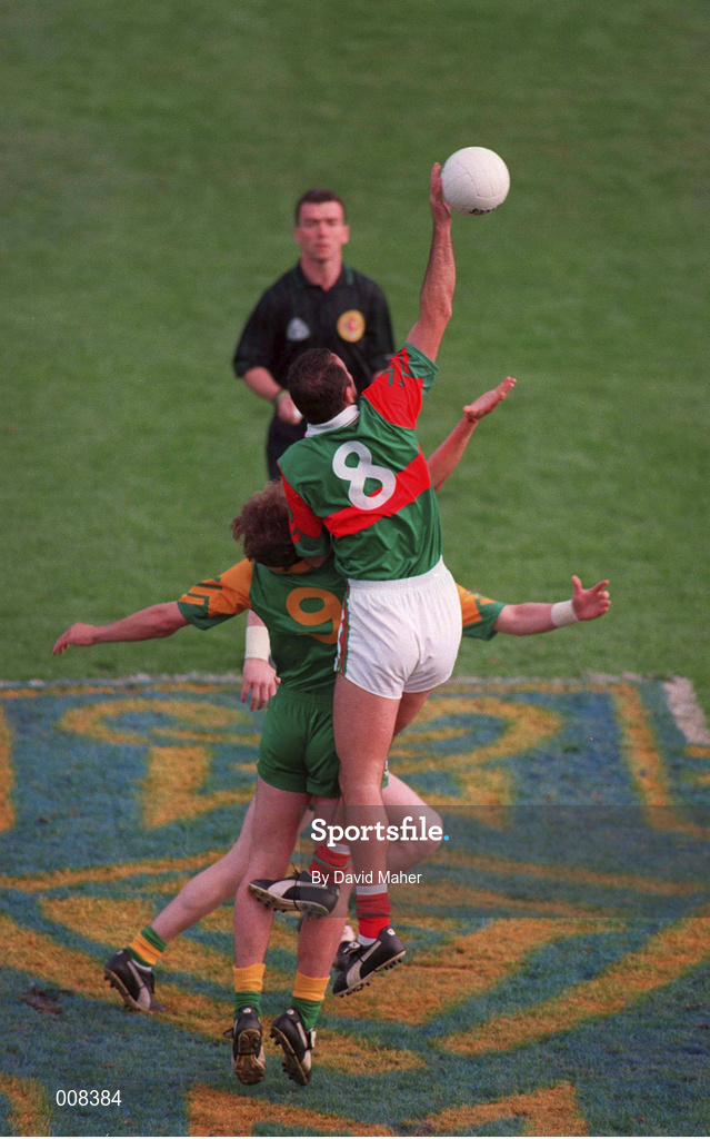 15 September 1996; Liam McHale of Mayo rises above Meath's John McDermott for the first touch of the Bank of Ireland All-Ireland Senior Football Championship Final between Meath and Mayo at Croke Park in Dublin. Photo by David Maher/Sportsfile