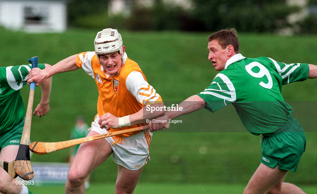 21 June 1998; Malachy Molloy of Antrim in action against Pat Jordan of London during the Guinness Ulster Senior Hurling Championship Semi-Final Replay match between Antrim and London at Casement Park in Belfast, Antrim. Photo by Damien Eagers/Sportsfile