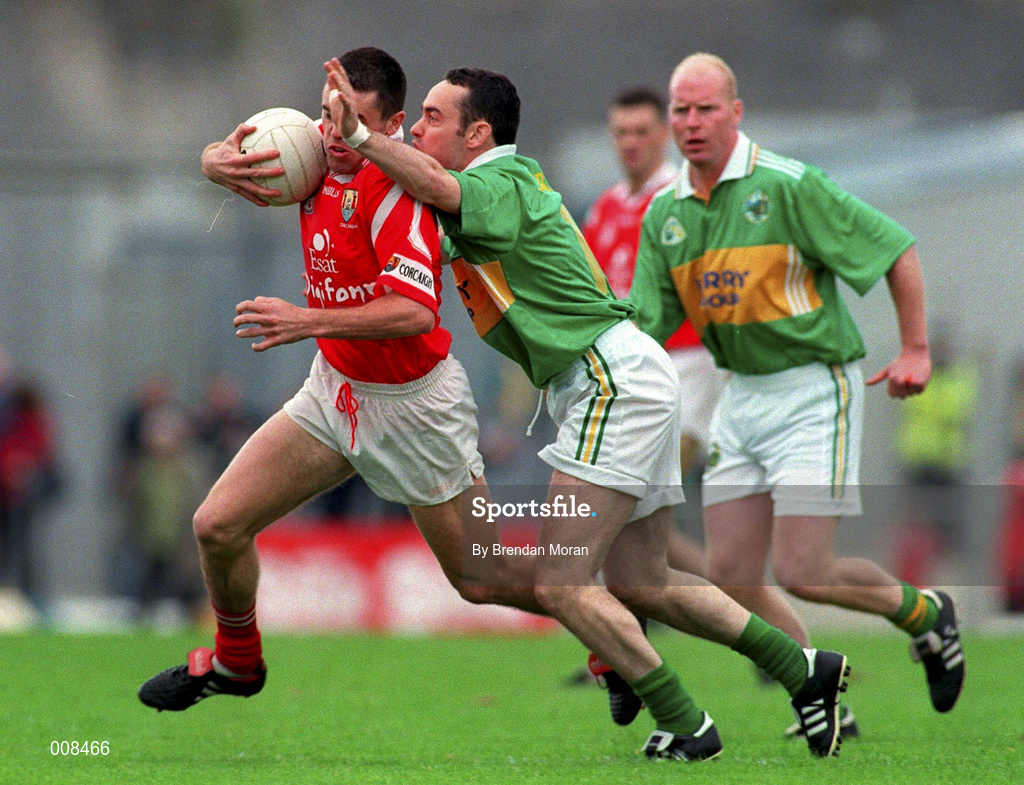 5 July 1998; Martin Cronin of Cork in action against Pa Laide of Kerry during the Bank of Ireland Munster Senior Football Championship Semi-Final match between Kerry and Cork at Fitzgerald Stadium in Killarney, Kerry. Photo by Brendan Moran/Sportsfile