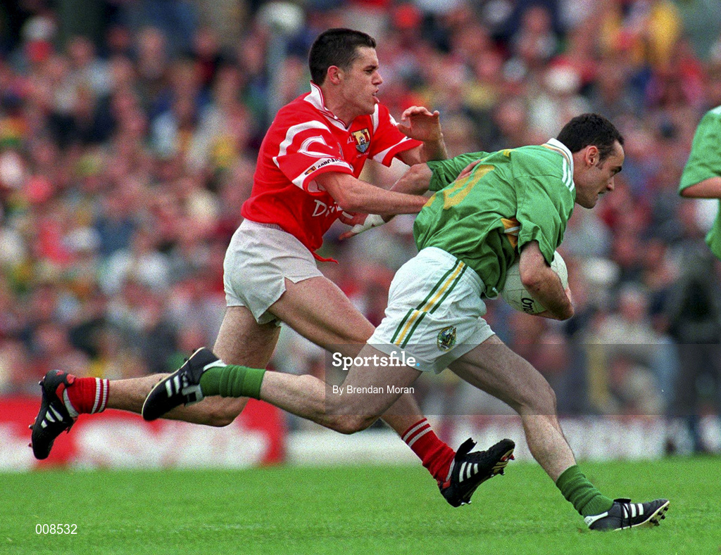 5 July 1998; Pa Laide of Kerry in action against Martin Cronin of Cork during the Bank of Ireland Munster Senior Football Championship Semi-Final match between Kerry and Cork at Fitzgerald Stadium in Killarney, Kerry. Photo by Brendan Moran/Sportsfile