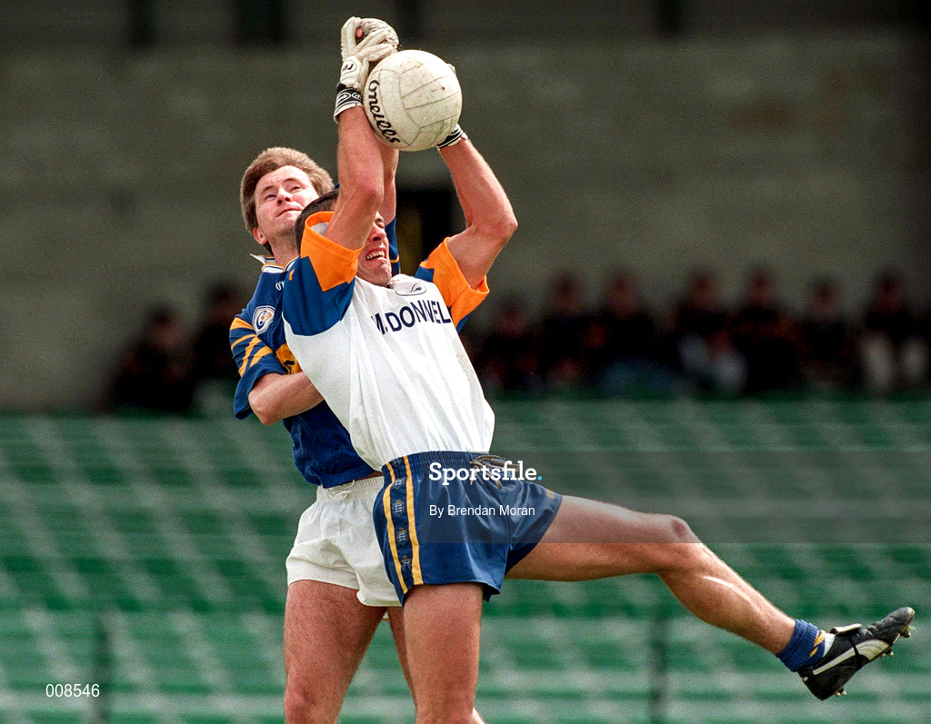 28 June 1998; Padraig Gallagher of Clare in action against Peter Lambert of Tipperary during the Bank of Ireland Munster Senior Football Championship Semi-Final match between Tipperary and Clare at the Gaelic Grounds in Limerick. Photo by Brendan Moran/Sportsfile