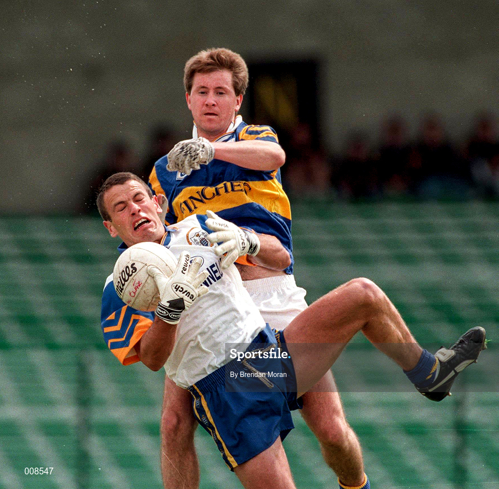 28 June 1998; Padraig Gallagher of Clare in action against Peter Lambert of Tipperary during the Bank of Ireland Munster Senior Football Championship Semi-Final match between Tipperary and Clare at the Gaelic Grounds in Limerick. Photo by Brendan Moran/Sportsfile
