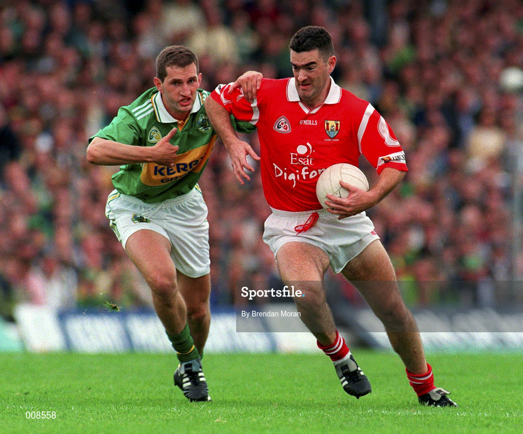 5 July 1998; Pat Hegarty of Cork in action against Donal Daly of Kerry during the Bank of Ireland Munster Senior Football Championship Semi-Final match between Kerry and Cork at Fitzgerald Stadium in Killarney, Kerry. Photo by Brendan Moran/Sportsfile