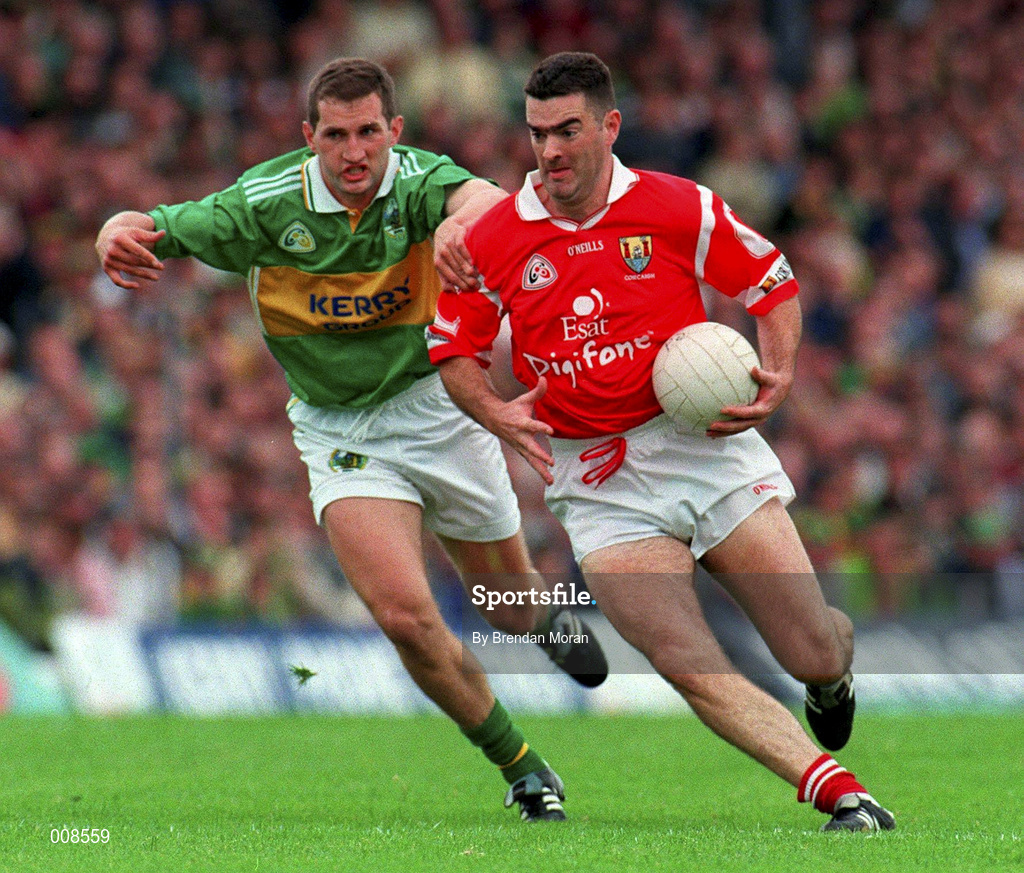 5 July 1998; Pat Hegarty of Cork in action against Donal Daly of Kerry during the Bank of Ireland Munster Senior Football Championship Semi-Final match between Kerry and Cork at Fitzgerald Stadium in Killarney, Kerry. Photo by Brendan Moran/Sportsfile