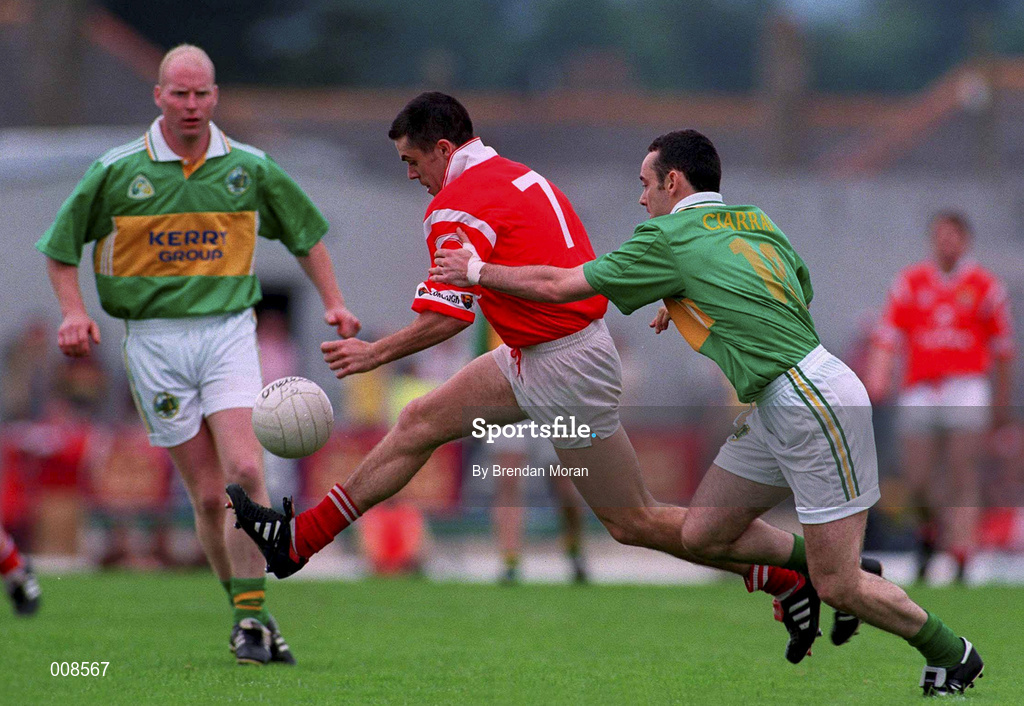 5 July 1998; Martin Cronin of Cork in action against Pa Laide of  Kerry during the Bank of Ireland Munster Senior Football Championship Semi-Final match between Kerry and Cork at Fitzgerald Stadium in Killarney, Kerry. Photo by Brendan Moran/Sportsfile
