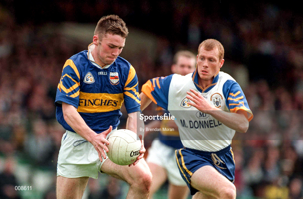 28 June 1998; Niall Kelly of Tipperary in action against Michael Liddane of Clare during the Bank of Ireland Munster Senior Football Championship Semi-Final match between Tipperary and Clare at the Gaelic Grounds in Limerick. Photo by Brendan Moran/Sportsfile