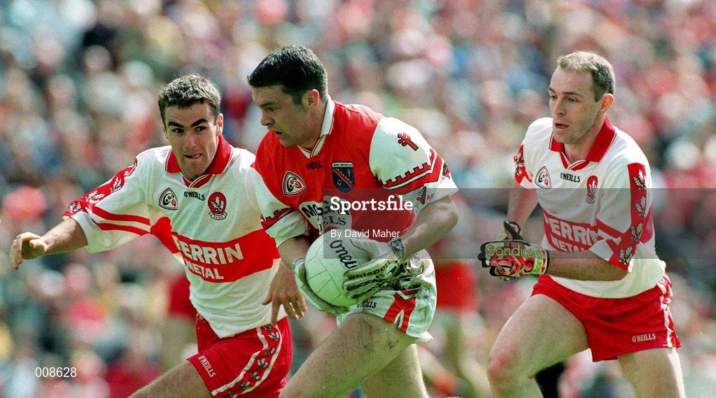 28 June 1998; Oisin McConville of Armagh in action against Sean Martin Lockhart and Henry Downey, right, of Derry during the Bank of Ireland Ulster Senior Football Championship Semi-Final match between Armagh and Derry at St Tiernach's Park in Clones, Monaghan. Photo by David Maher/Sportsfile