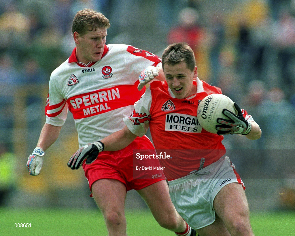 28 June 1998; Patrick McKeever of Armagh is tackled by Paul Diamond of Derry during the Bank of Ireland Ulster Senior Football Championship Semi-Final match between Armagh and Derry at St Tiernach's Park in Clones, Monaghan. Photo by David Maher/Sportsfile