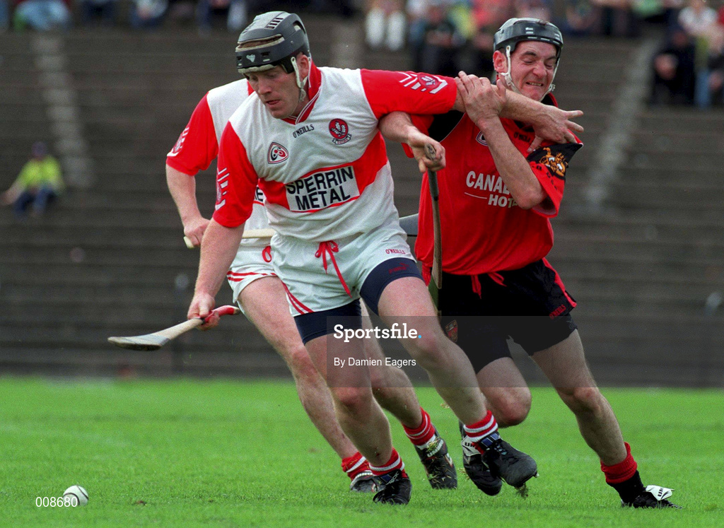21 June 1998; Paul McCloy of Derry in action against Anthony Tinnelly of Down during the Guinness Ulster Senior Hurling Championship Semi-Final match between Derry and Down at Casement Park in Belfast, Antrim. Photo by Damien Eagers/Sportsfile