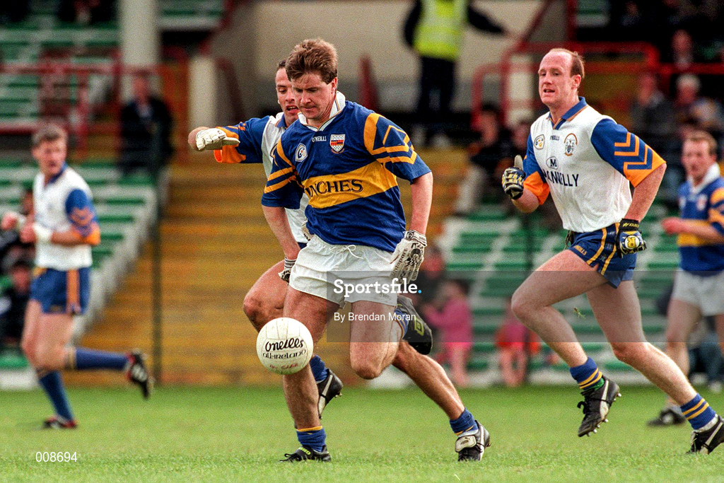 28 June 1998; Peter Lambert of Tipperary in action against Padraig Gallagher of Clare during the Bank of Ireland Munster Senior Football Championship Semi-Final match between Tipperary and Clare at the Gaelic Grounds in Limerick. Photo by Brendan Moran/Sportsfile
