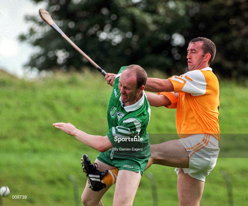21 June 1998; Jim Kennedy of London in action against Seamus McMullan of Antrim during the Guinness Ulster Senior Hurling Championship Semi-Final Replay match between Antrim and London at Casement Park in Belfast, Antrim. Photo by Damien Eagers/Sportsfile