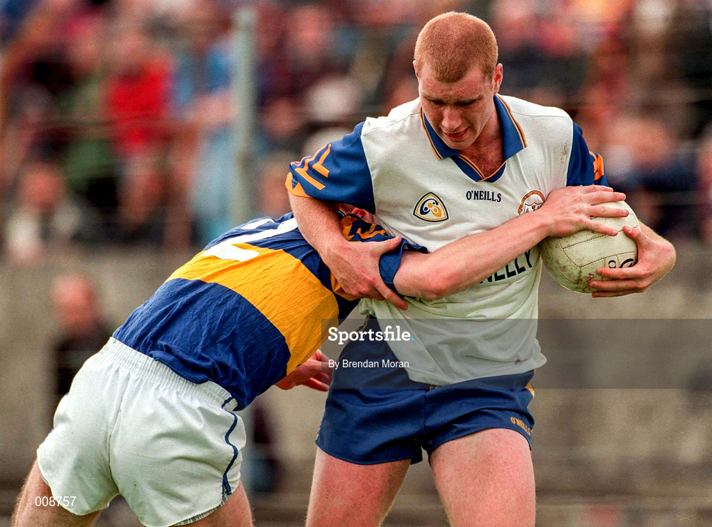 28 June 1998; Senan Hehir of Clare holds off the challenge of Niall Kelly of Tipperary during the Bank of Ireland Munster Senior Football Championship Semi-Final match between Tipperary and Clare at the Gaelic Grounds in Limerick. Photo by Brendan Moran/Sportsfile