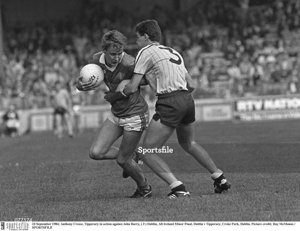 23 September 1984; Anthony Crosse, Tipperary in action against John Barry, ( 3 ) Dublin, All Ireland Minor Football Final, Dublin v Tipperary, Croke Park, Dublin. Picture credit; Ray McManus / SPORTSFILE