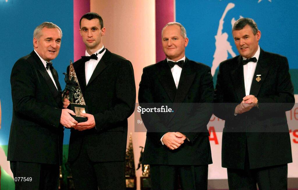 30 November 2001; Thomas Dunne, Tipperary, receives his award from An Taoiseach Bertie Ahern TD, Paul Donovan, Chief Executive, Eircell Vodafone and Sean McCague, President, Cumann Luthchleas Gael, at the Eircell Vodafone AllStar Awards at the CityWest Hotel, Dublin. Hurling. Picture credit; Ray McManus / SPORTSFILE *EDI*