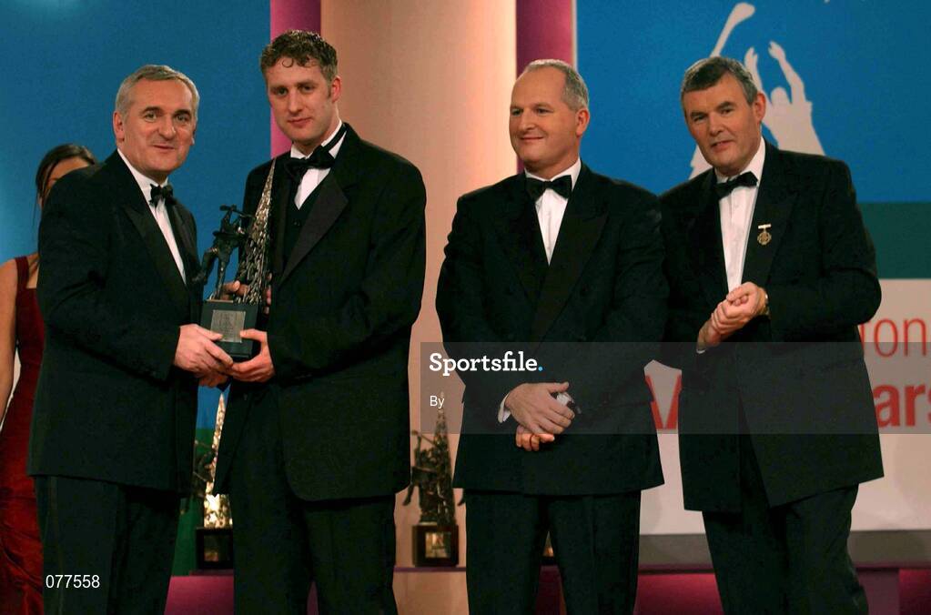 30 November 2001; Eddie Enright, Tipperary, receives his award from An Taoiseach Bertie Ahern TD, Paul Donovan, Chief Executive, Eircell Vodafone and Sean McCague, President, Cumann Luthchleas Gael, at the Eircell Vodafone AllStar Awards at the CityWest Hotel, Dublin. Hurling. Picture credit; Ray McManus / SPORTSFILE *EDI*