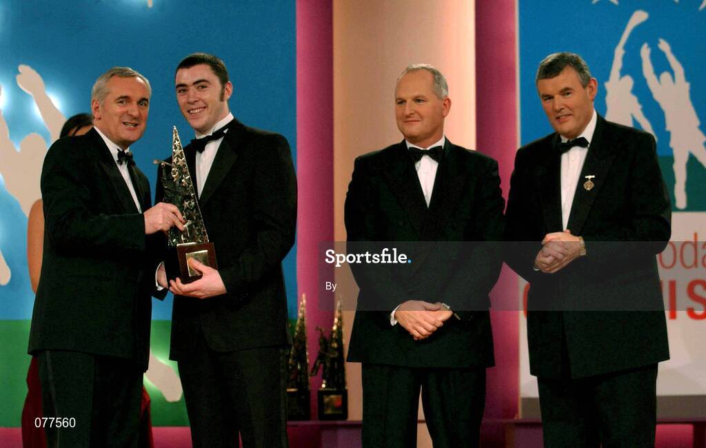30 November 2001; Eugene Cloonan, Galway, receives his award from An Taoiseach Bertie Ahern TD, Paul Donovan, Chief Executive, Eircell Vodafone and Sean McCague, President, Cumann Luthchleas Gael, at the Eircell Vodafone AllStar Awards at the CityWest Hotel, Dublin. Hurling. Picture credit; Ray McManus / SPORTSFILE *EDI*