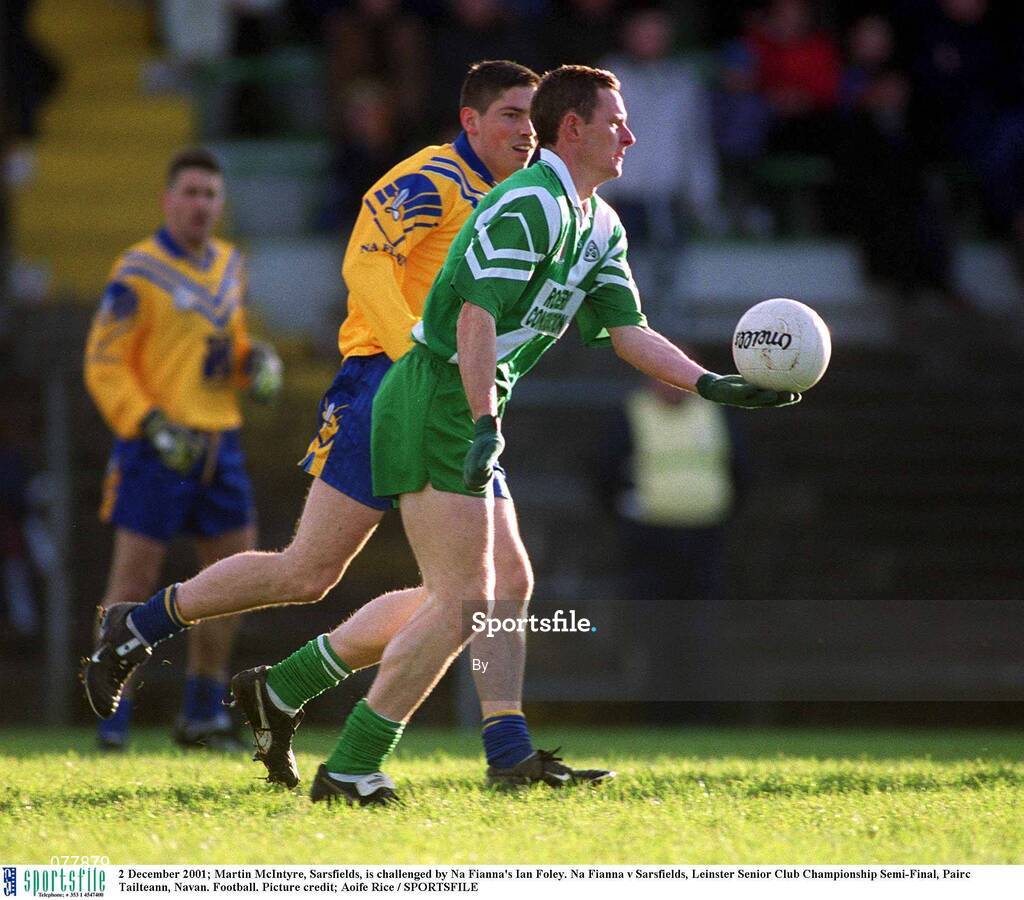 2 December 2001; Martin McIntyre, Sarsfields, is challenged by Na Fianna's Ian Foley. Na Fianna v Sarsfields, Leinster Senior Club Championship Semi-Final, Pairc Tailteann, Navan. Football. Picture credit; Aoife Rice / SPORTSFILE