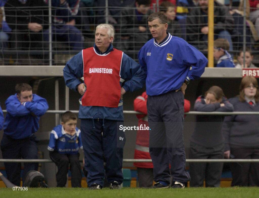 11 November 2001; Thurles manager Paddy Doyle, left, and trainer Paddy McCormack look on from the sideline. Toomevara v Thurles Sarsfields, Tipperary County Club Hurling Final, Semple Stadium, Thurles, Co. Tipperary. Picture credit; Brendan Moran / SPORTSFILE *EDI*