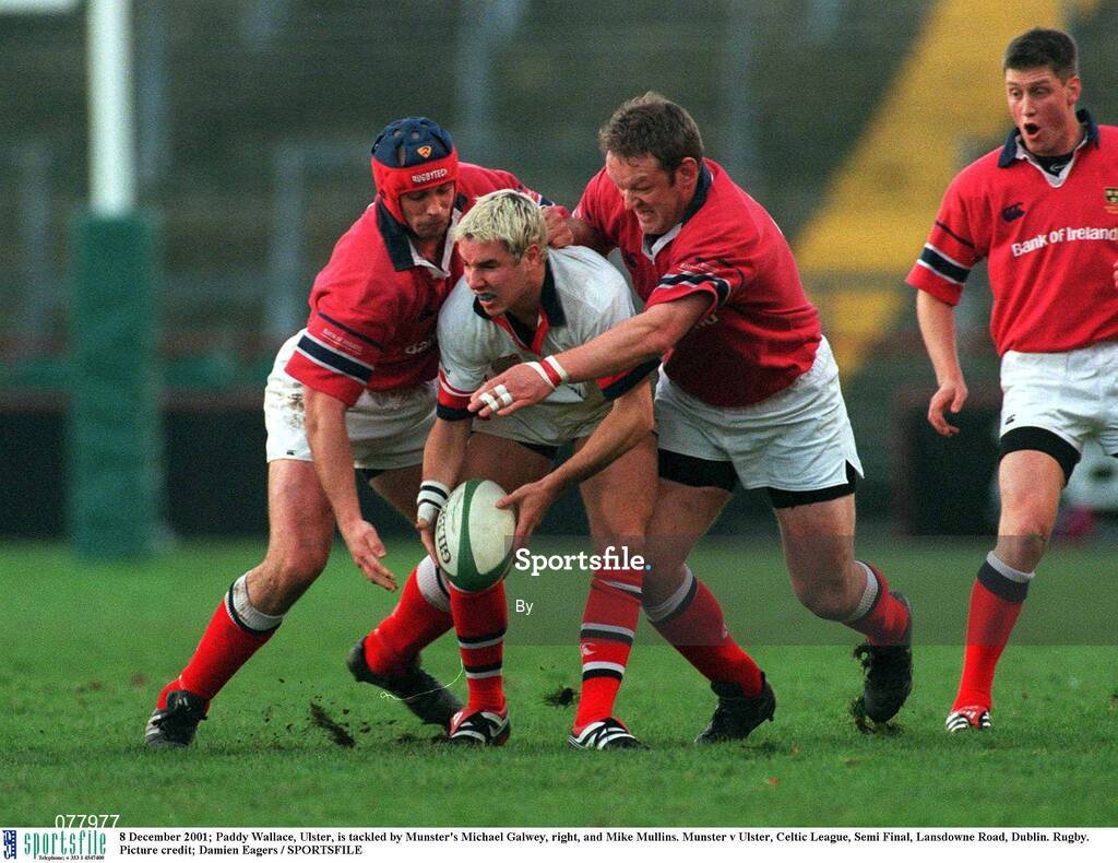 8 December 2001; Paddy Wallace, Ulster, is tackled by Munster's Mick Galwey, right, and Alan Quinlan. Munster v Ulster, Celtic League, Semi Final, Lansdowne Road, Dublin. Rugby. Picture credit; Damien Eagers / SPORTSFILE